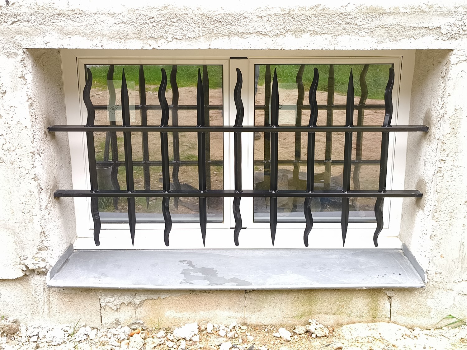 Grille De Défense (Guénan)